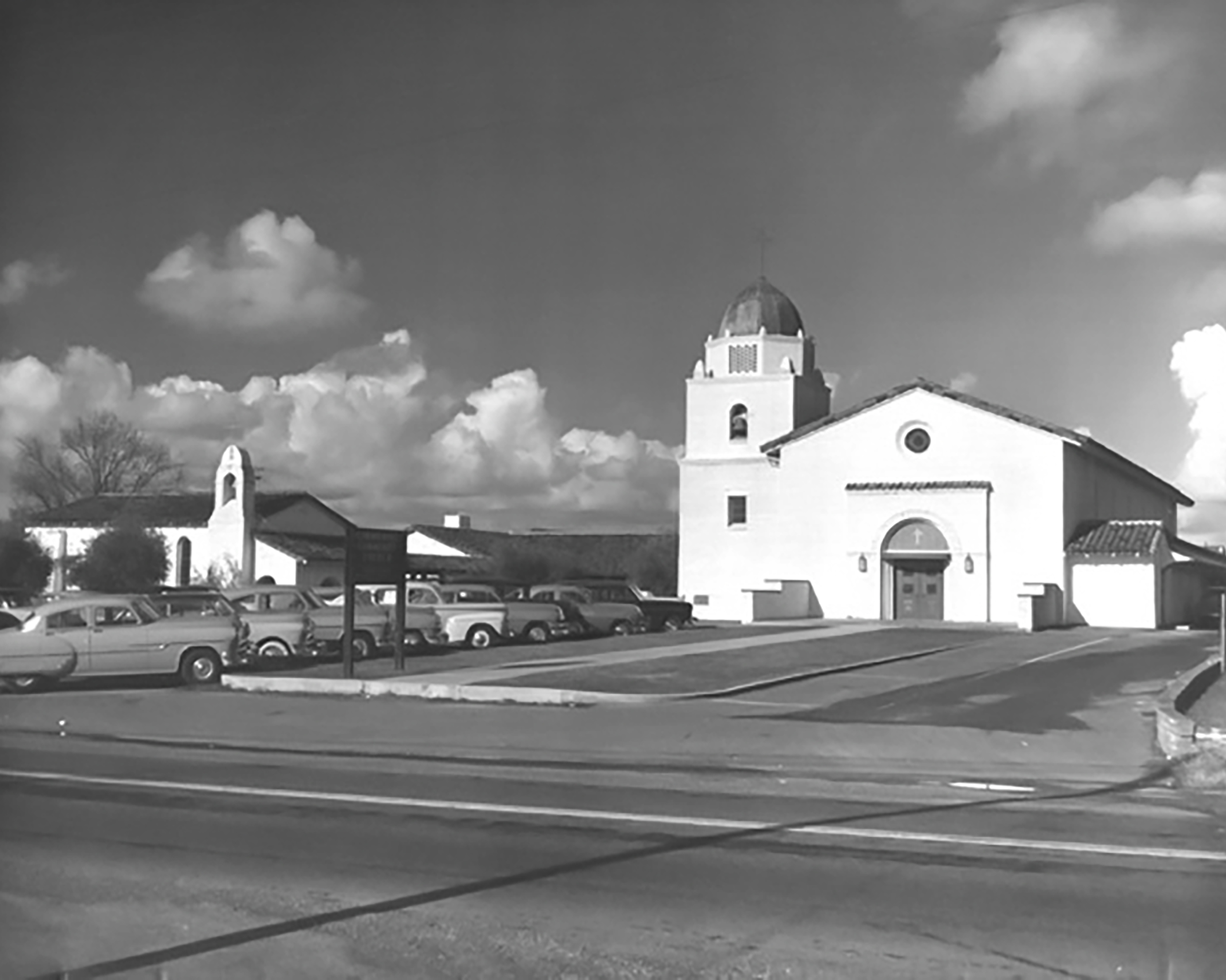 A black and white photograph of the front of the church in 1952